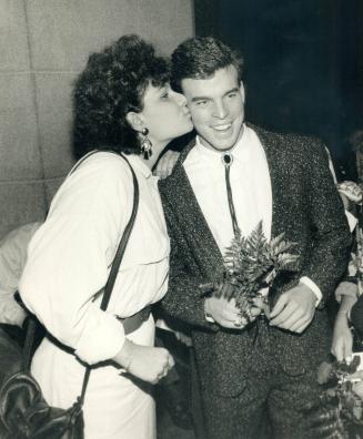 Many Meffe, 15, attended the Meet the Leafs Luncheon in the Toronto Convention Centre at noon yesterday to present a bonquet and plant a kiss on the c(...)