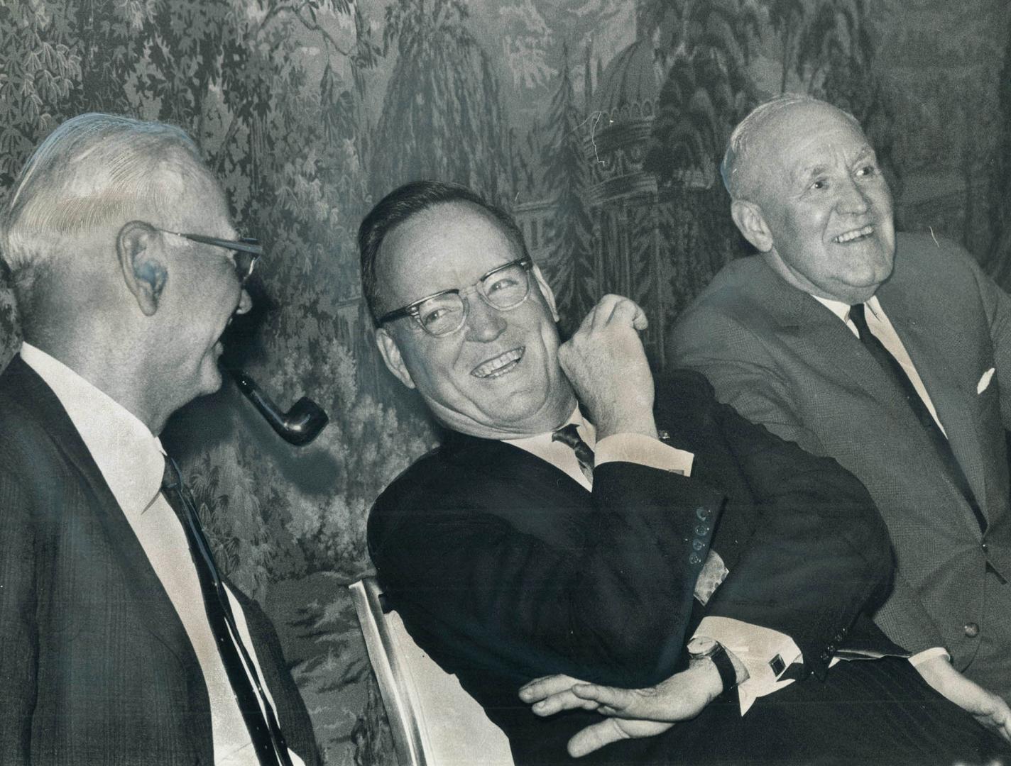 Enjoying his night is Ralph Cowan (centre), retiring promotion manager of The Star, who was guest of honor at a testimonial dinner at the King Edward (...)