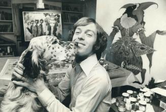 The best skater in Canada, 24-year-old Toller Cranston, plays with his English setter, Lapis Lazuli, in his studio in the home of his skating coach, E(...)