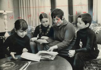 Shirley Crombie with Robin, 7, left, Carrie, 10, Jonathan, 6