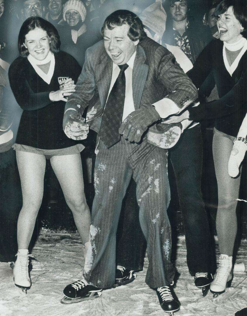 The joy of victory or of surviving the race? Mayor David Crombie is all smiles and wrinkled suit as he collapses into arms of University of Toronto fi(...)