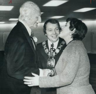 Toronto Mayor David Crombie, wearing his chain of office, and his wife welcome lieutenant-Governor W