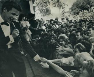 his 1,000 girls-that's rock 'n' ola who Sunday afternoon trigred an explosion of sound in pastoral Italian Gardens