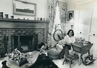 Huge fireplace in the living-room is an addition to the historic house