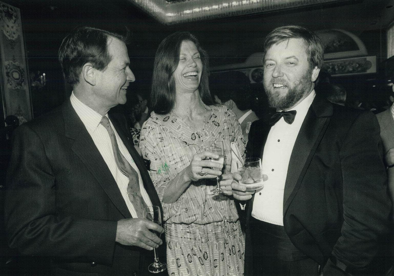 Toronto Symphony president Geoffrey McKenzie, managing partner of Coopers and Lybrand Consulting Group, chats after the show with soprano Anna Tamm-Re(...)