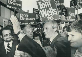 Premier Davis and wife, Kathy, right on campaign trail: Readers comlain about election advertising, in letter at left