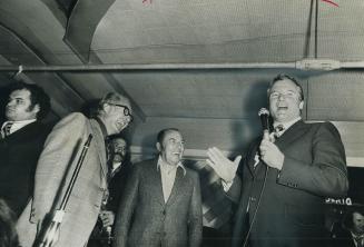 All things are a little different, says Premier William Davis (right) after listening to the music of band leader Woody Herman (left) last night. at P(...)