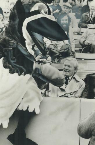 Friend or foe? Ontario Premier William Davis got the razz from Blue Jays' mascot BJ Bird before opening ceremonies at Exhibition Park yesterday. The p(...)