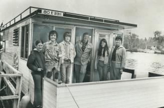 A Houseboat Cruise on the Trent Canal is the holiday this year for Premier William Davis (centre), his wife, Kathleen (right), and their children, Meg(...)