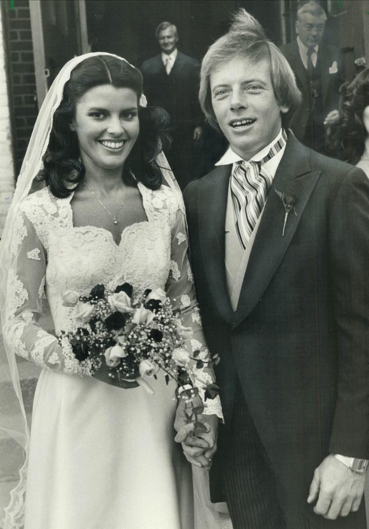 The knot's tied. Cathy Davis, daughter of Premier William Davis and wife Kathleen, stands by her new husband Robert Meilsoe. The couple was married in(...)