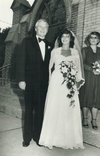 Premier Bill Davis arriving at church with his daughter Nancy