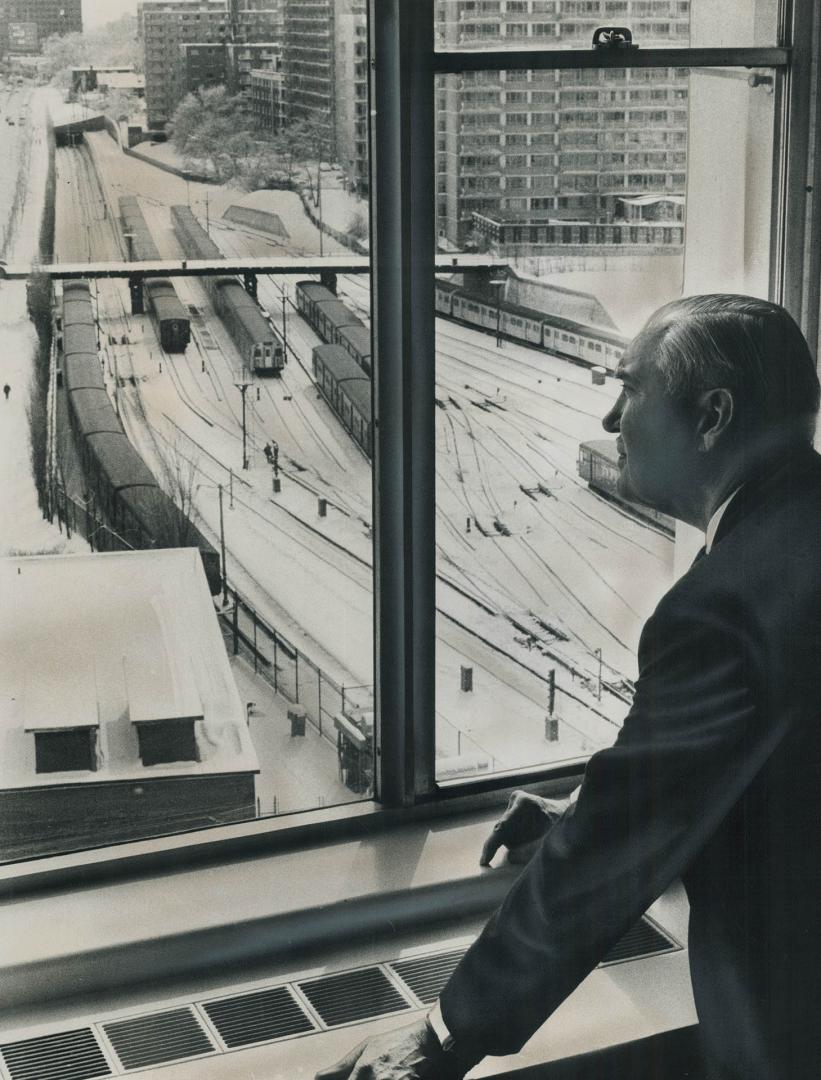 Ralph Day looks over Davisville yard