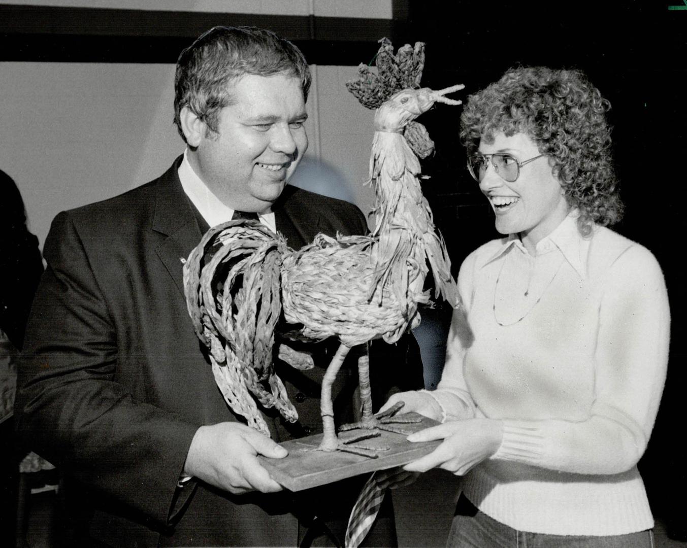 Whose chicken? Scarborough Alderman Joe Dekort holds a rooster he bought last year for $75 at the Scarborough Historical Society auction. He is donati(...)