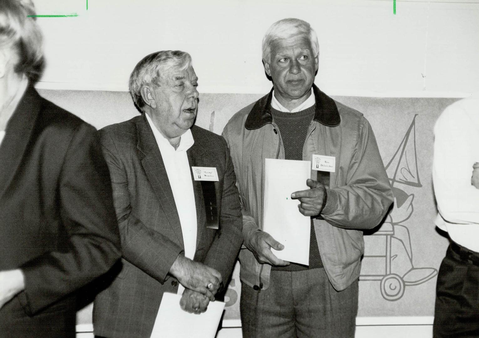 Hockey History: NHL Hall of Famers Gump Worsley, left, and Alex Delvecchio gather with other sports celebritites prior to the Conn Smythe dinner last night