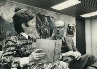 Taking his weekly lesson in French from his tutor Judith Favier, in his City Hall office, Mayor William Dennison answers questions, in French, from ho(...)