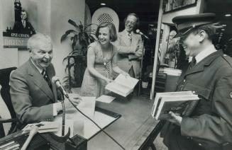 Author Diefenbaker on the Job. Right in his element, John Diefenbaker spent a couple of hours at Eaton's store in the Toronto Eaton Centre yesterday a(...)