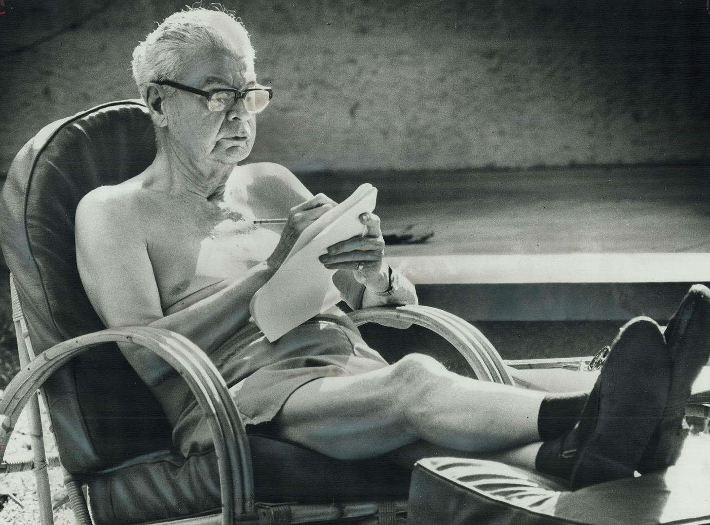 Former prime minister John Diefenbaker relaxes on patio at his Barbados cottage while working on final volume of his memoirs. Star writer Val Sears sa(...)