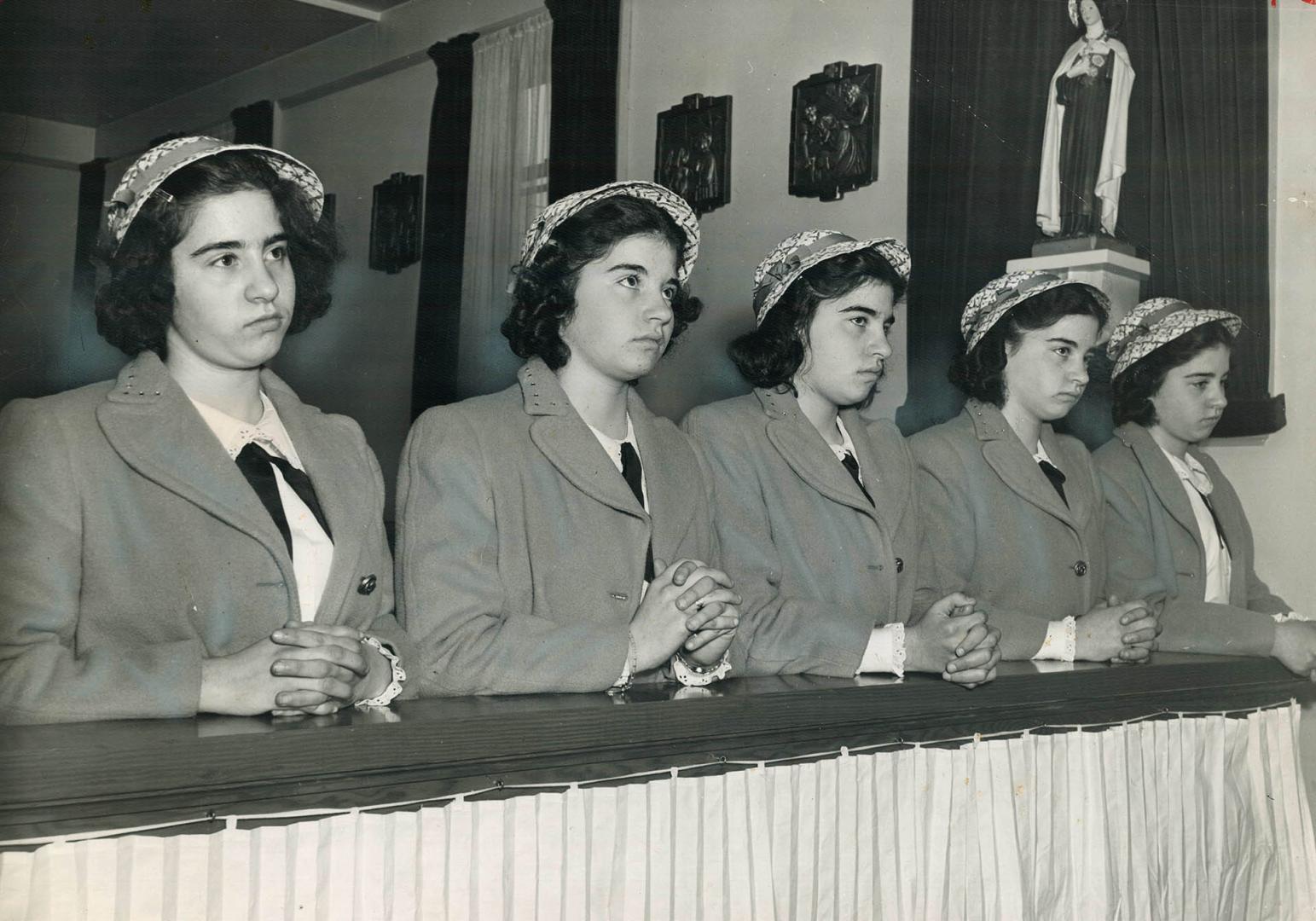 Surviving quints, Yvonne, left, Annette and Cecile at sister Marie's funeral 9 years ago