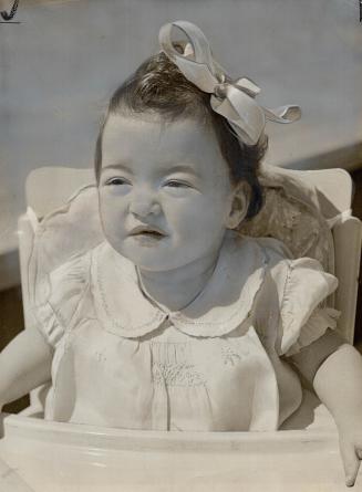 Smallest of famous five in highchair