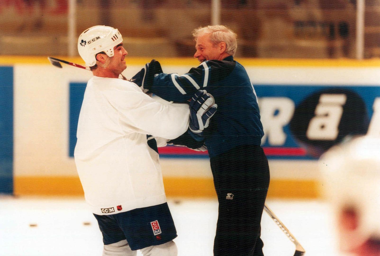 Tie Domi (left) Groups and Terry Simpson