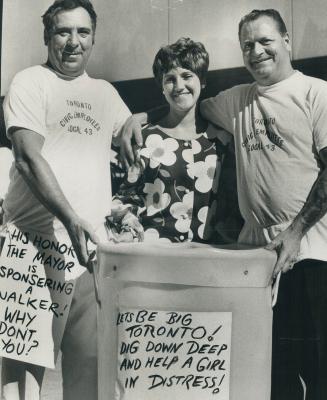 City workers Nick Cordeau (left) and Buddy McIlmoyle put their arms around Yvonne Dorion, the girl left partly paralyzed after being knifed 3 months ago