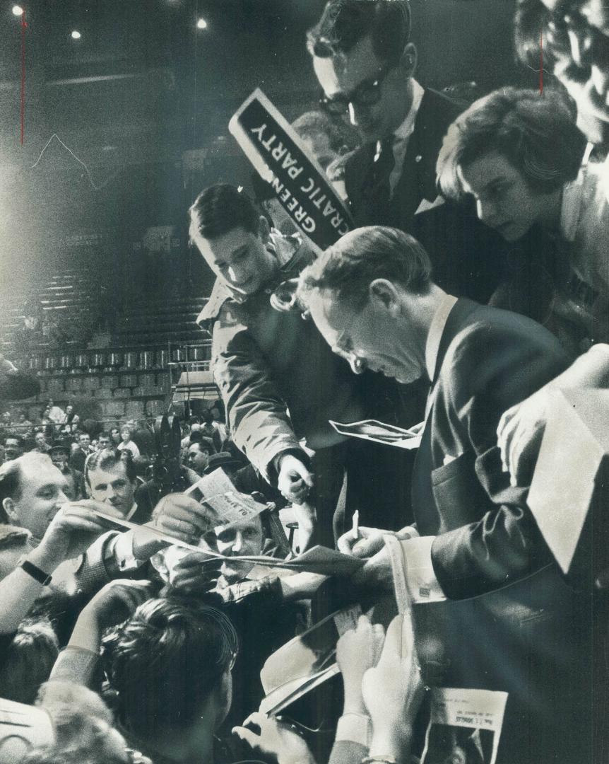 Autograph seekers besiege NDP leader Tommy Douglas