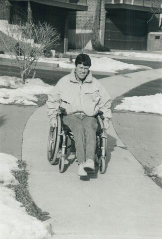 Adjusting: Above, former crane operator Joe Dowdall, 33, was injured in a runaway elevator accident at the Scotia Plaza construction site in August, 1987