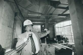 Garth Drabinsky conducts tour of North York Performing Arts Centre under construction