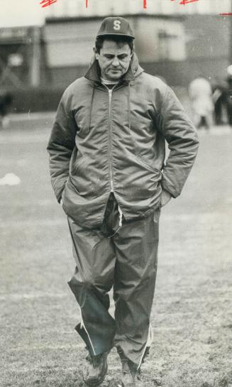 Dejected: Calgary coach Jim Duncan slowly walks off field after his Stamps were beaten, 23-10 by Montreal Alouettes in Saturday's Grey Cup game at the CNE