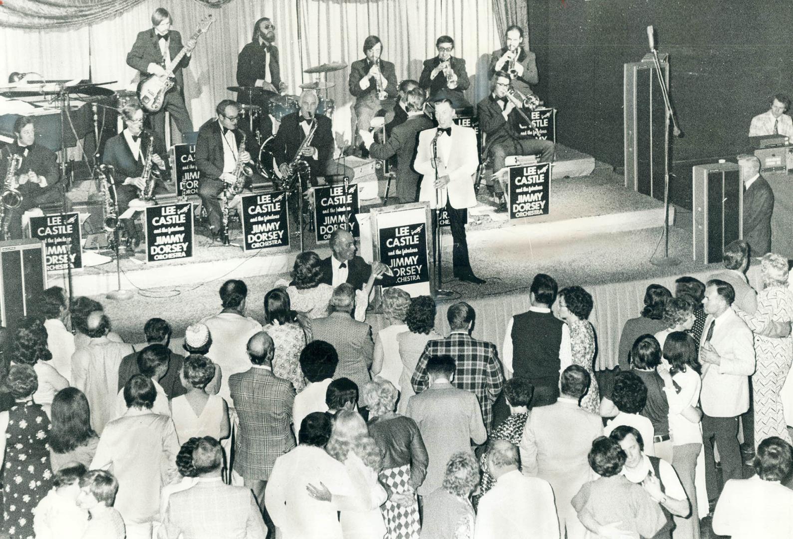 Singer Bob Eberly led the Jimmy Dorsey Band through its paces for 1,000 dancers at the 'big band month' dance in the International Centre on Airport R(...)