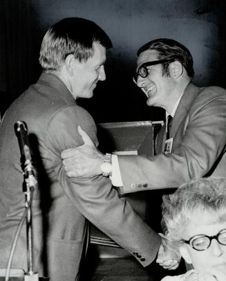 Counsel taken by surprise. National Hockey League Players Association surprises its legal counsel and director, R. Alan Eagleson (right), with plaque (...)