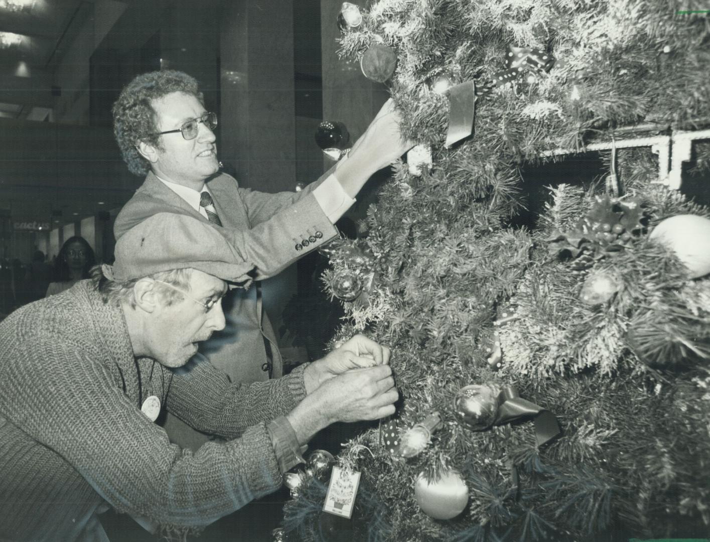 Charlie and the mayor. Toronto Mayor Art Eggleton gets a helping hand from rustic Charlie Farquharson - really showbusiness personality Don Harron - a(...)