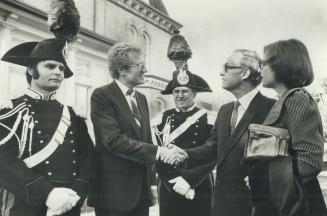 Italians celebrate. Toronto Mayor Art Eggleton, left, is welcomed to a reception honor National Day by Italian Consul-General Pier Luigi Conti and his(...)