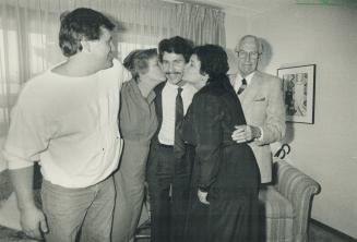 Phillip Engs landed at Pearson Airport yesterday, after 68 days in an Iranian prison, to hugs and kisses from his mother Sylvia, left, and sister Alis(...)