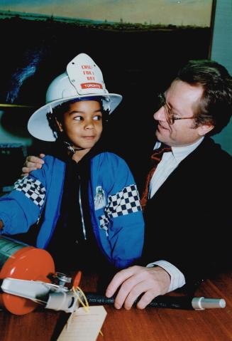 Fire chief for a day. Mayor Art Eggleton welcomes 6-year-old Deaman Potvin to his office today. The Bowmore Road Public School pupil was selected Fire(...)