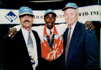 Robert Esmie (centre), (l) Stan Bharti (r) George Faught