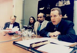 Suit lunched: Bharti and Pramod Odhavji and lawyer Julian Falconer speak at news conference yesterday about plans to sue the police