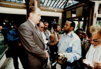 Lennox Farrell and Metro Police Superintendent Walter Tervell