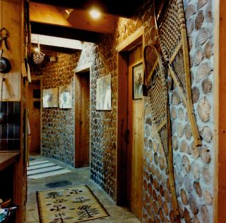 Curved space dominates the interior (above) in the innovative cottage built by local farmer Walter Madill (left) for Molly Ferguson and her late husband Bob, 25 years ago