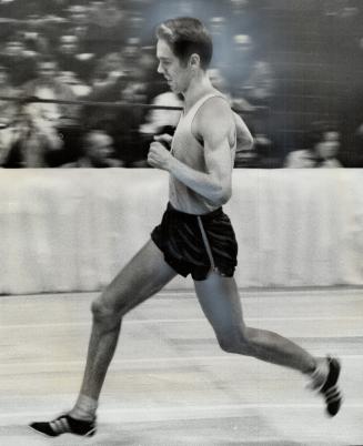 Romping to victory, Toronto's Bob Finlay gallops along as he laps the entire field in the three mile race