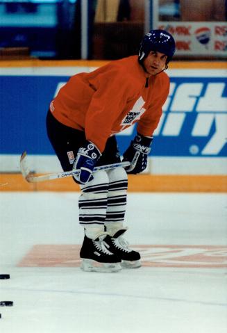 Young at heart: Maple Leafs veteran Mike Foligno, sporting a shiny new helmet, prepares to battle youngsters at training camp