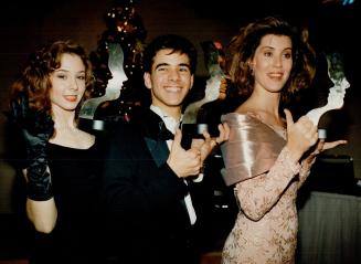 Winning Smiles: Actors Megan Follows (Anne of Green Gables, The Sequel), Pat Mastroianni (Degrassi Junior High), and Sonja Smits (Street Legal) proudly display Gemini's won for their TV performances