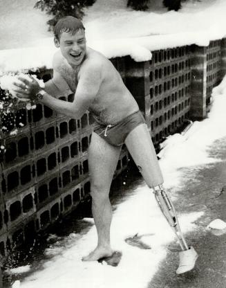 Swimm and snowball fight in outdoor pool at Glacier Park Lodge