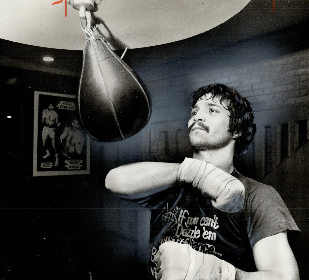 In fighting trim. Nicky Furlano works out for his Friday night encounter withLeo Marsh, one of the bouts on card that begins at 7:30 at St. Lawrence M(...)