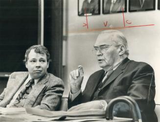 Mayor David Crombie listens intently as Frederick G