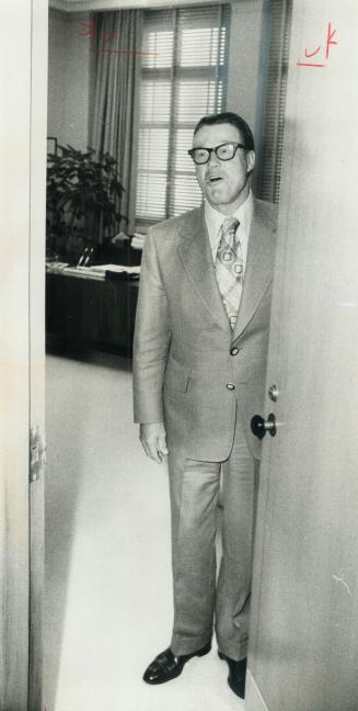 Ontario Hydro Chairman George Gathercole, stands in the door of his office today