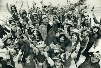 Pied Piper Bobby Gimby, whose Ca-na-da was almost a theme song of Centennial Year, visits Arbor Glen Public School in North York yesterday to lead the(...)