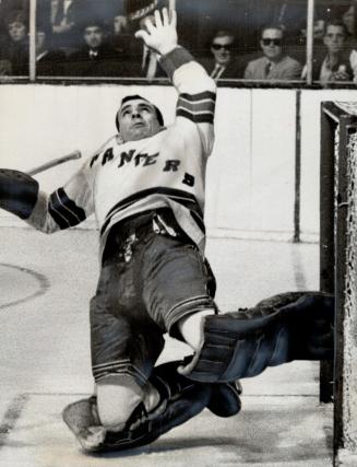 The past..... and the present. This acrobatic action shows NHL's all-star goalies Glenn Hall (top) and Ed Giacomin, Chicago's Hall was last year's fir(...)