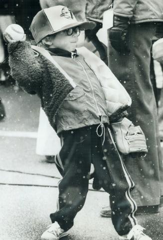 Metro chief's son Robin Godfrey, 4, 'practises' near dugout