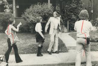 John F. Bassett and daughter, Vicky, 13, on way to see Eaton daughter